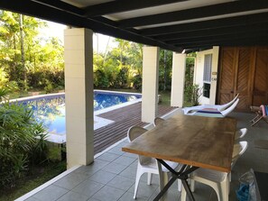 Large extended 12' deep covered patios keep the house cooler