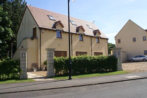 The property is accessed by an external staircase.