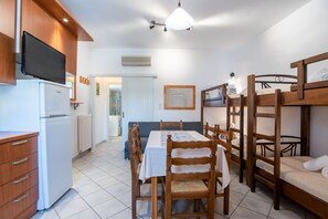 Your large bedroom with 2 bunk beds and a sofa bed 