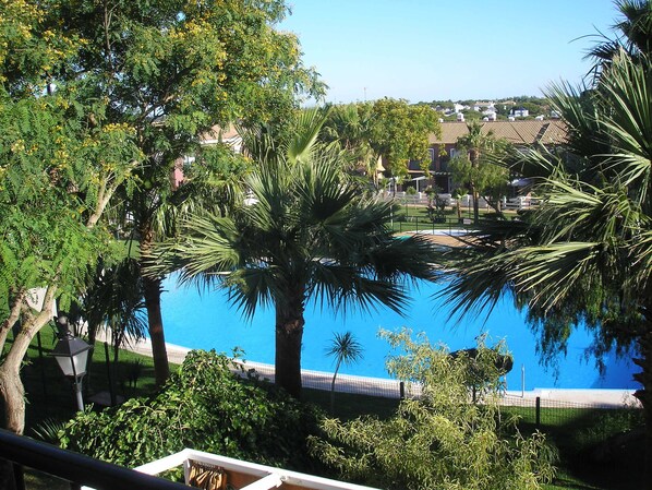 Enjoy the swimming pool right below your balcony