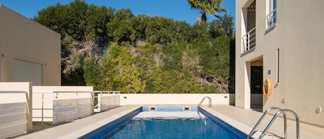 Front door by the pool steps