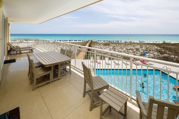 Large private balcony with direct beach and pool views