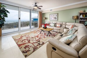 Gaze out towards the beach while relaxing on the couch