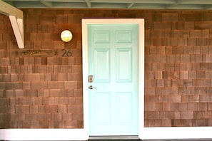 The key pad entry front door, and under cover parking for two large vehicles.