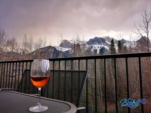 View from one of the three decks. 
Patio table, Chair for guests to relax.
