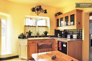 Kitchen opens to a lovely patio for easy outdoor entertaining