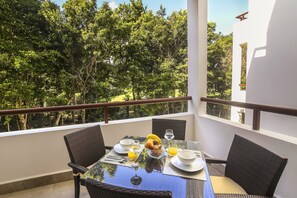 Balcony with a beautiful, green view of the golf course