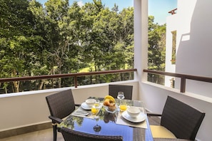 Balcony with a beautiful, green view of the golf course