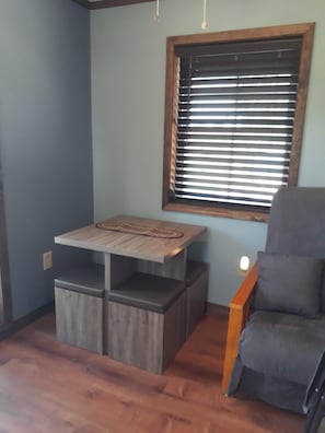 This small kitchen table provides dining area for four.