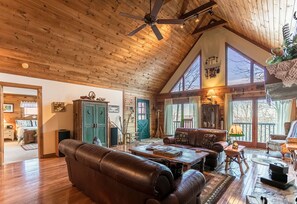 Living room with leather furniture and fireplace