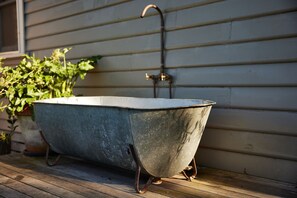 Outdoor antique farmhouse bath.