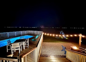 Heated salt water pool, private pier, and fire pit are a perfect setting!