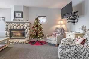 Living Room with Cozy Gas Fireplace and Flat Screen Tv