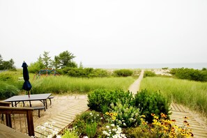 Wooden boardwalk offers easy access to the beach.