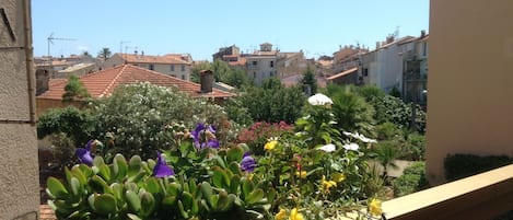 View from a very sunny and peaceful balcony with nice window box