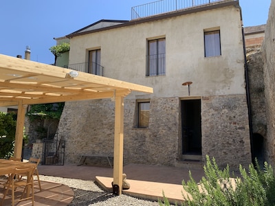 Stone house in Santa Severina with beautiful garden view of the Sila mountains