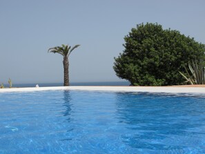 Pool overlooking the sea Mediterranean