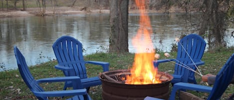 Enjoy a fire by the river