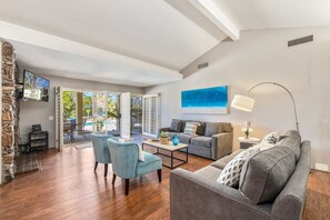 Living Room with patio doors to pool