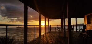 Sunset from Flamingo Point; largest covered deck on Water Island