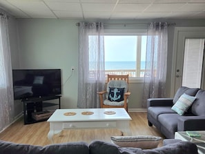 living room and door to deck