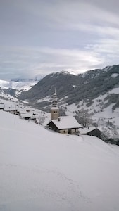 at the foot of the slopes in a typical Savoyard village