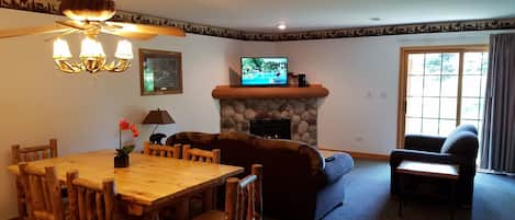 The family room is located right off the kitchen for a spacious event setting.