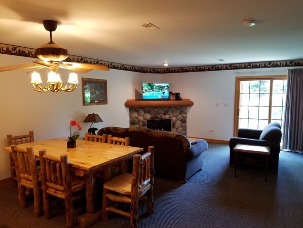 The family room is located right off the kitchen for a spacious event setting.
