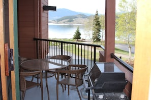 Lake view from balcony and living room, plus grill with natural gas hookup