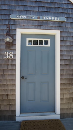 Our front door and quarterboard, a Nantucket tradition from the whaling era.