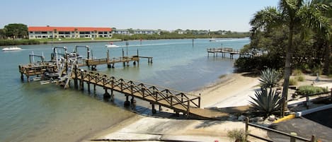 Unique waterfront setting with small beach and private fishing pier