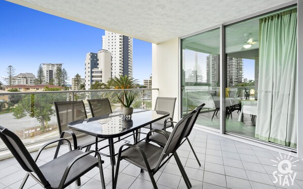 Enjoy your morning coffee in this balcony overlooking the city