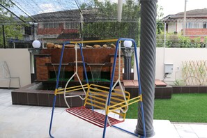  Swing for kids in the porch area