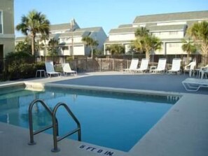 Pool with Condo Street View in background