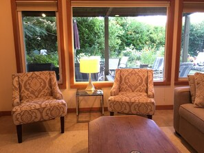 View of backyard and garden from living room windows.