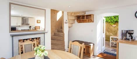 Open plan kitchen and dining leading to private courtyard