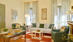 The living room has a terrace and a balcony
