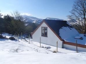 It's not always snowy but the view over Yr Wyddfa (Snowdon) and the lake remain.