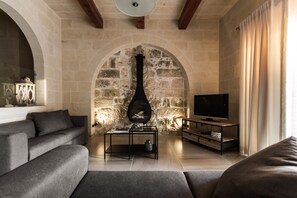 Living room with wood burning fireplace