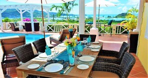 Enjoy a meal overlooking the pool and Caribbean Sea at AntiguaSoleil.