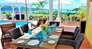 Enjoy a meal overlooking the pool and Caribbean Sea at AntiguaSoleil.