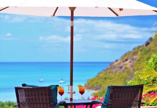 A perfect spot for two overlooking the Caribbean Sea.