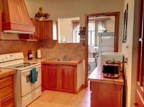 Kitchen & separate laundry room.