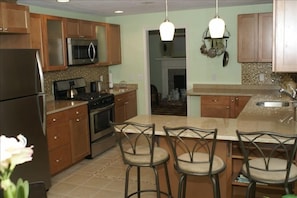 New kitchen with granite and stainless