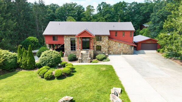 Front view of property. Sitting on the most accessible level 1 acre of land.
