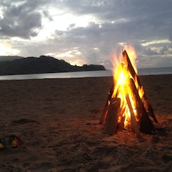 Fire & Sunset on the Beach. We just walked down from the home that evening.