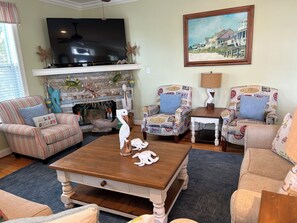 Main Floor Living Room with Large TV and Seating for up to 10 people
