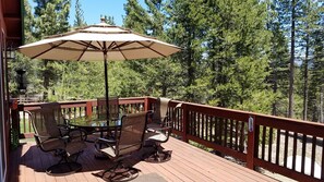 Large upper deck with patio and BBQ.  Forest views!