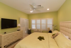 Master Bedroom  with views of Kaibo Beach and a slider door to the lanai.