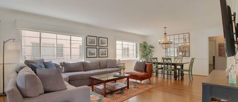Terrific open floor plan with seating for everyone to enjoy a board game or movie on Netflix